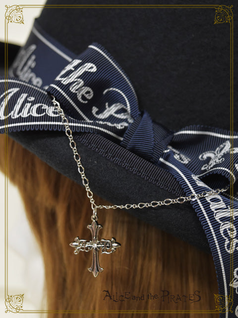 Hat with cross charm