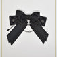 Le petit chaperon noir ribbon clip