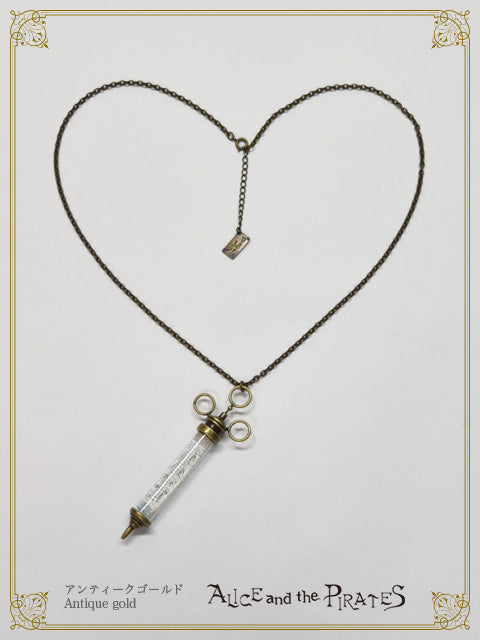 Heart filled syringe necklace